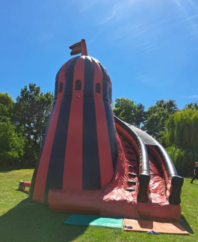 Helter Skelter Mega Slide, a inflatable slide for hire from Bouncy Castle Club