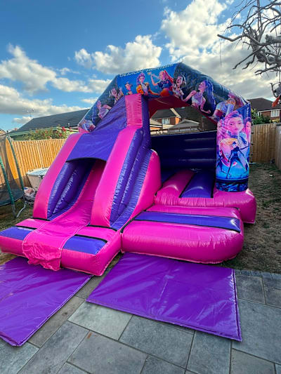 12ft x12ft K pop Demon Hunter Bounce and Slide, a bounce and slide combo for hire from Bounce House Inflatables