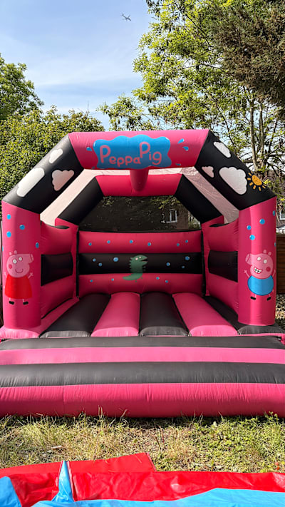 15ft x 12ft Peppa bouncy castle ( LARGE ), a bouncy castle for hire from TFG Bouncy Castles