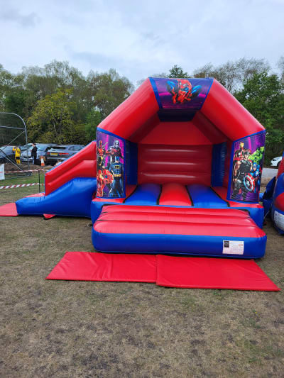Super Hero Side Slide Combo, a bounce and slide combo for hire from Kendall's Castles