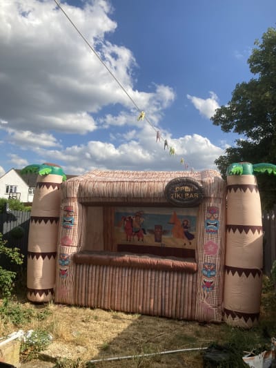 Tiki Bar 14x16, a bouncy castle for hire from Wallington Bouncy Castles