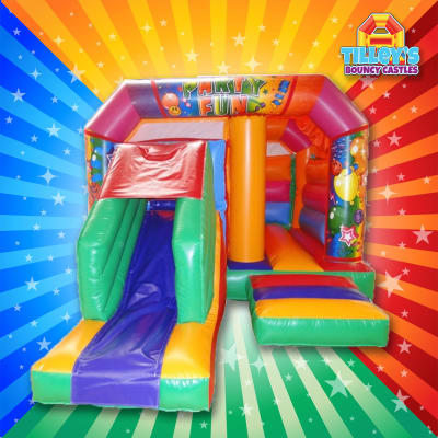 Carnival Bounce & Slide, a bounce and slide combo for hire from Tilley's Bouncy Castles and Soft Play Hire