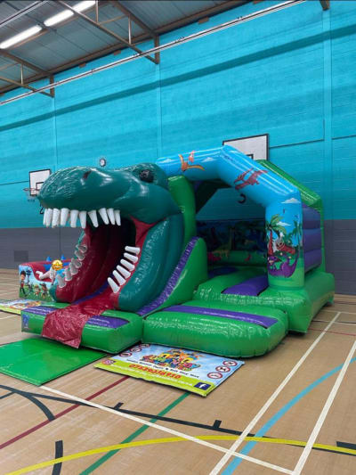 Dinosaur Bounce N Slide, a bounce and slide combo for hire from Jump N Joy Inflatables