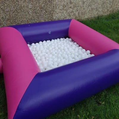 Pink & Purple Inflatable Ball Pool, a soft play set for hire from Chloe's Castles