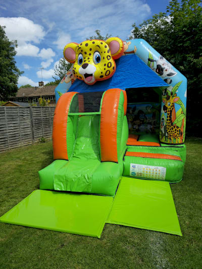 12ft x 13ft 3D Jungle Adventure Bouncy Castle With Slide, a bounce and slide combo for hire from MLM Bouncy Castles