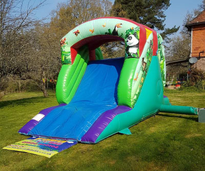 Inflatable Slide 11ft High Jungle themed, a inflatable slide for hire from 1st Choice Inflatables