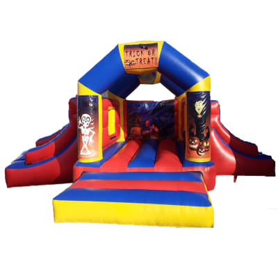 Halloween Bouncer Double Slide, a bounce and slide combo for hire from Jumping Jacks