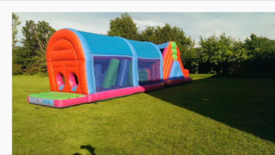55ft Adult Inflatable Assault Course, a assault course for hire from Animal Bouncers