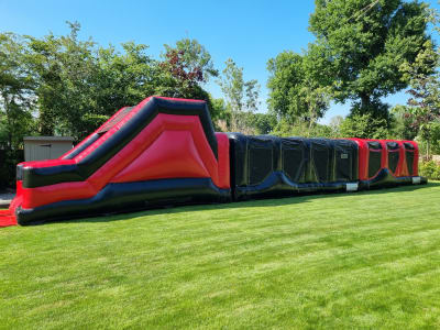 3 Part red & Black Obstacle Hire Surrey, a assault course for hire from Alpha Bouncy Castles & Events