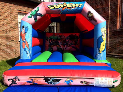 15 x 12 Super Hero bouncy castle ( LARGE ), a bouncy castle for hire from TFG Bouncy Castles