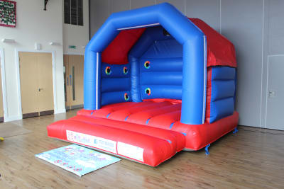 (BC-0) "Plain" Red & Blue Themed Bouncy Castle, a bouncy castle for hire from KiDz Parties LLP