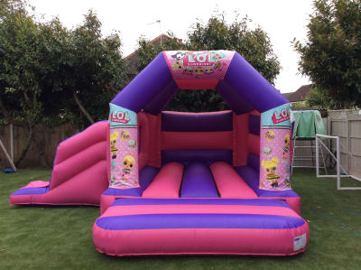 LOL SUPRISE BOUNCY CASTLE 16ft vs 15ft, a bouncy castle for hire from All Bounce Surrey