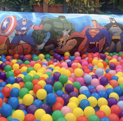 Super hero Juggler ball pond, a soft play set for hire from SK Hire Events