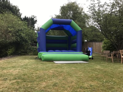 13 x 15 Blue and green adult castle, a adult bouncy castle for hire from Wallington Bouncy Castles