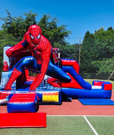 Spiderman Bounce n Slide, a bounce and slide combo for hire from Bouncy Mania