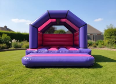 Purple & Pink Bouncy Castle 12x12ft, a bouncy castle for hire from The Bounce Boutique