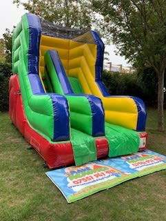 Tropical Bubble Gum Bouncy Slide, a bounce and slide combo for hire from Let's Make Memories