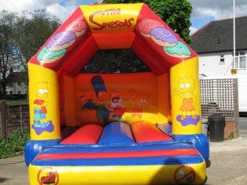 Simpsons, a bouncy castle for hire from Bouncy Castle Club