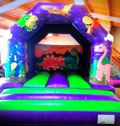 Dinosaur Bouncy Castle (12 x 14), a bouncy castle for hire from Cookes Castles