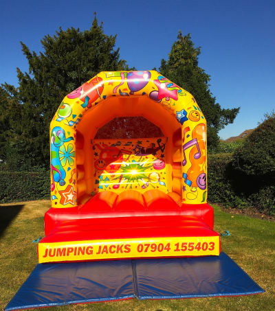 10 X 13 Carnival Theme, a bouncy castle for hire from Jumping Jacks Bouncy Castles