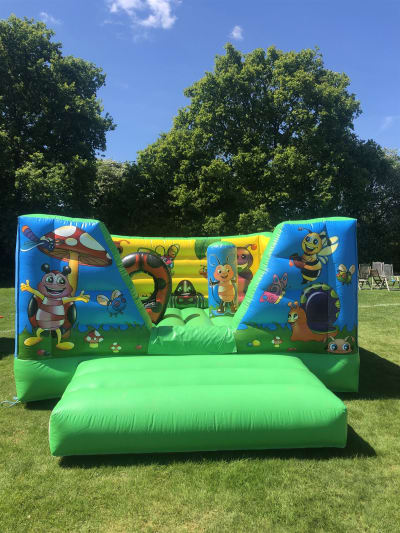 12ft x 15ft Bugs Life Bouncy Castle, a bouncy castle for hire from Rick's Castles