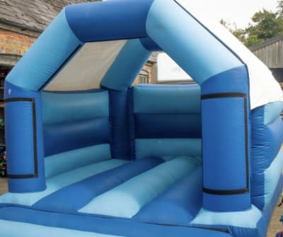 Plain Blue castle., a bouncy castle for hire from Kidz Smile