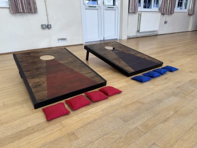 Cornhole game, a inflatable game for hire from Jumping Jacks Bouncy Castles
