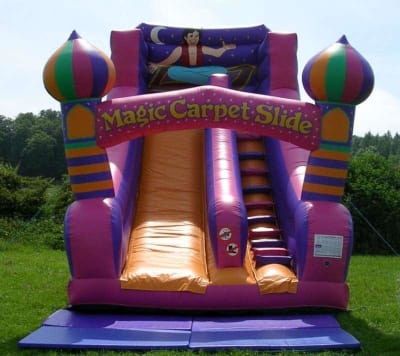 18ft Aladdin Magic Carpet Giant Slide, a inflatable slide for hire from Jump & Bounce