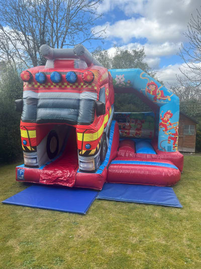3D Fire Truck Castle With Slide, a bounce and slide combo for hire from Chloe's Castles