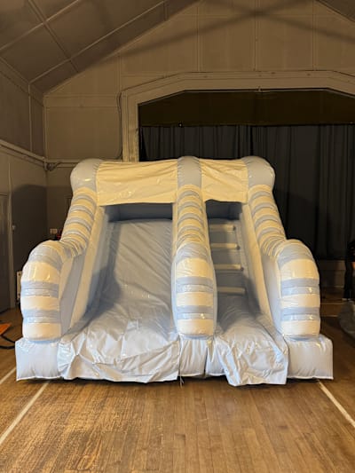Blue and White 5 FT platform Slide, a inflatable slide for hire from Bounce House Inflatables