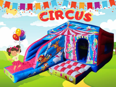 Circus Bouncy Castle with Slide 21x13ft, a bounce and slide combo for hire from Have A Bounce