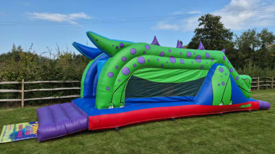 Assault Course Inflatable Dinosaur themed 30ft x 11ft, a assault course for hire from 1st Choice Inflatables