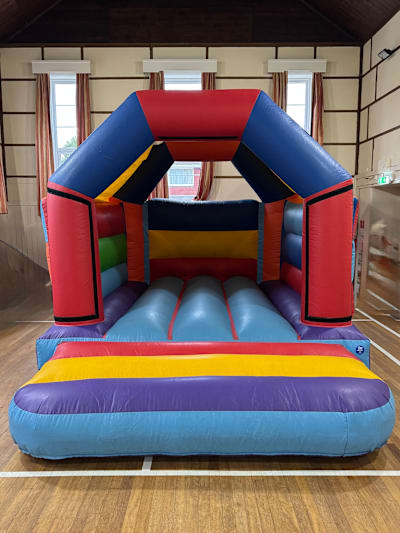 Multicoloured Castle (No Theme), a bouncy castle for hire from Bounce N Fun
