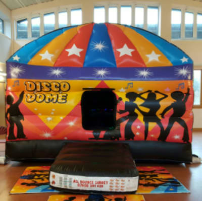 DISCO DOME BOUNCY CASTLE 18FT vs 15ft, a disco dome for hire from All Bounce Surrey