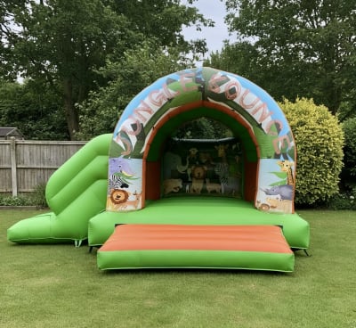 Jungle theme bouncy castle slide combo 12x18ft, a bounce and slide combo for hire from The Bounce Boutique
