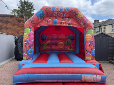 12 x 12FT Blue & Red Party Bouncy Themed (medium), a bouncy castle for hire from TFG Bouncy Castles