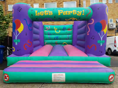 15 x 18 Let's Party 2 Castle, a bouncy castle for hire from Jump & Bounce