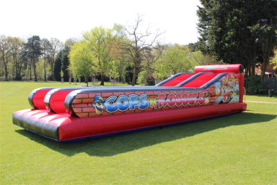 Bungee Run Hire Surrey, a assault course for hire from Allsorts Inflatables