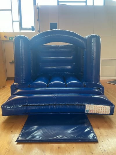 Low Height Glossy Blue Castle, a bouncy castle for hire from Bouncy Mania