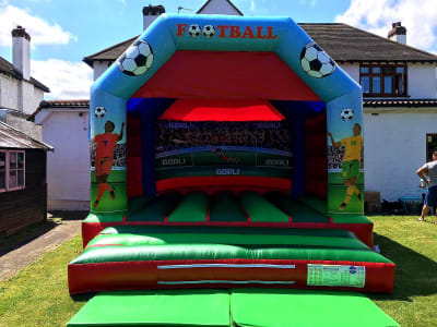 15 x 16 Adult Football Bouncy Castle (EXTRA LARGE), a adult bouncy castle for hire from TFG Bouncy Castles