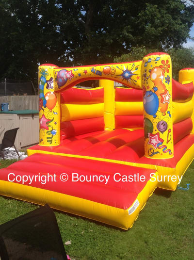 11x15 Carnival Theme Bouncy Castle, a bouncy castle for hire from Bouncy Castles Surrey