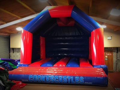 Red & Blue Bouncy Castle (15 x 17), a bouncy castle for hire from Cookes Castles