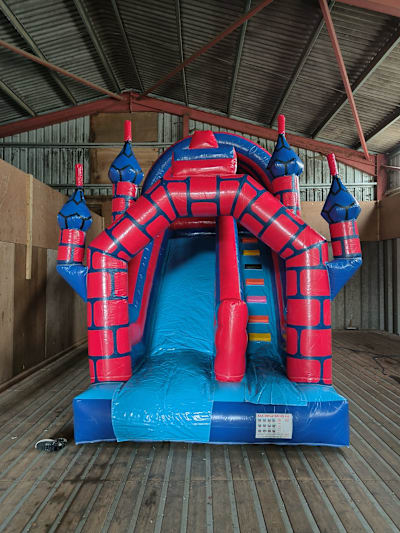 8ft Platform Slide, Red and Blue castle, a bounce and slide combo for hire from Sploj