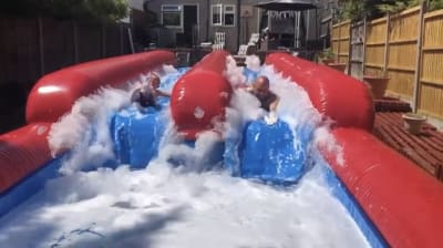 33ft Slip And Slide, a inflatable slide for hire from Harry's Quads 'N' Castles