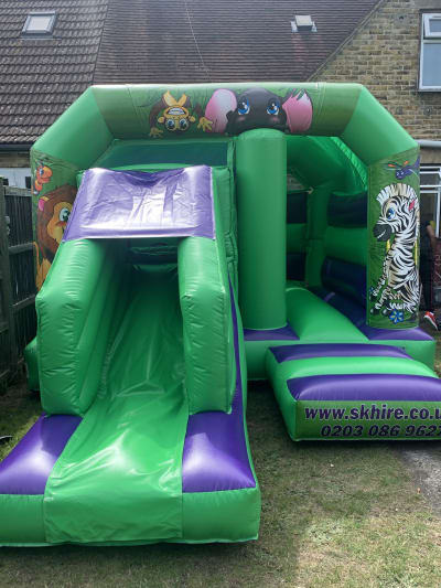 12' x 18 ft' Jungle Bounce, Jump and Slide Castle, a bounce and slide combo for hire from SK Hire Events
