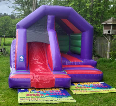 Slide Bouncer Bouncy Castle Plain with Front Slide, a bounce and slide combo for hire from 1st Choice Inflatables