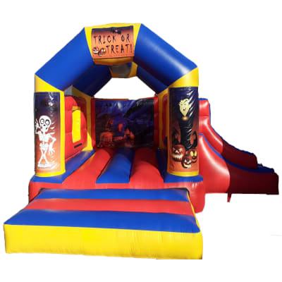 Halloween Bouncer Single Slide, a bounce and slide combo for hire from Jumping Jacks