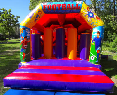 Football Obstacle, a assault course for hire from Jumping Jacks Bouncy Castles