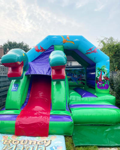 Dinosaur Bounce n Slide, a bounce and slide combo for hire from Bouncy Mania