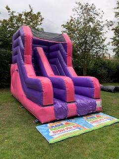 Pink Bubble Gum Bouncy Slide, a bounce and slide combo for hire from Let's Make Memories